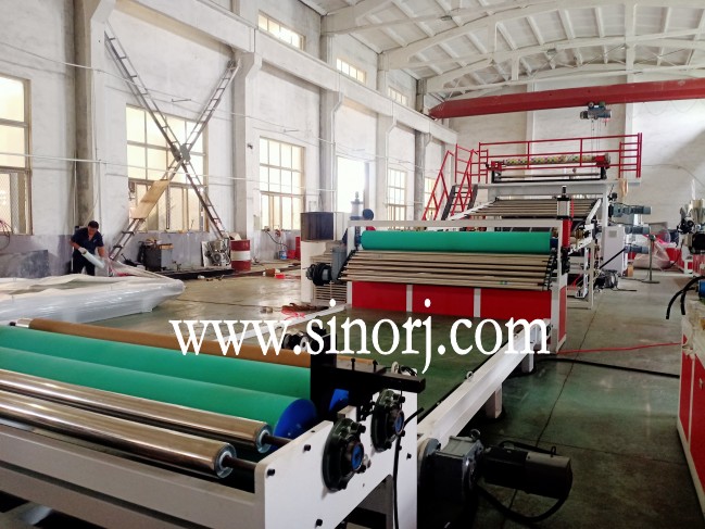 仿大理石板生產(chǎn)線，地板革生產(chǎn)線，三輥四輥集裝箱發(fā)貨中